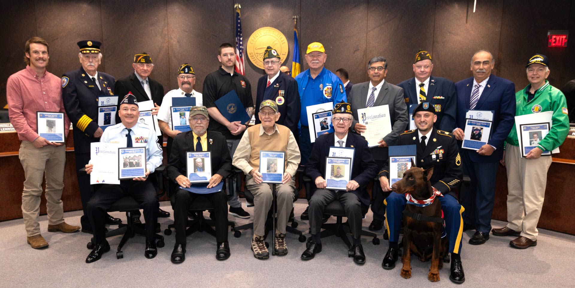 All 18 Legislative District Veteran of the Year honorees, including East Northport resident and Suffolk County Veteran of the Year Eugene Leavy (seated, center).