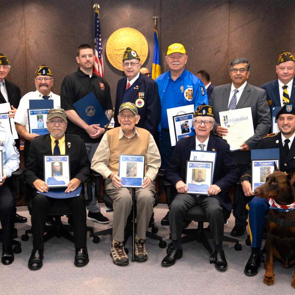 All 18 Legislative District Veteran of the Year honorees, including East Northport resident and Suffolk County Veteran of the Year Eugene Leavy (seated, center).