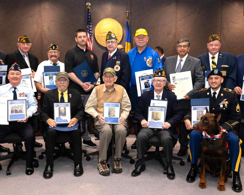 All 18 Legislative District Veteran of the Year honorees, including East Northport resident and Suffolk County Veteran of the Year Eugene Leavy (seated, center).