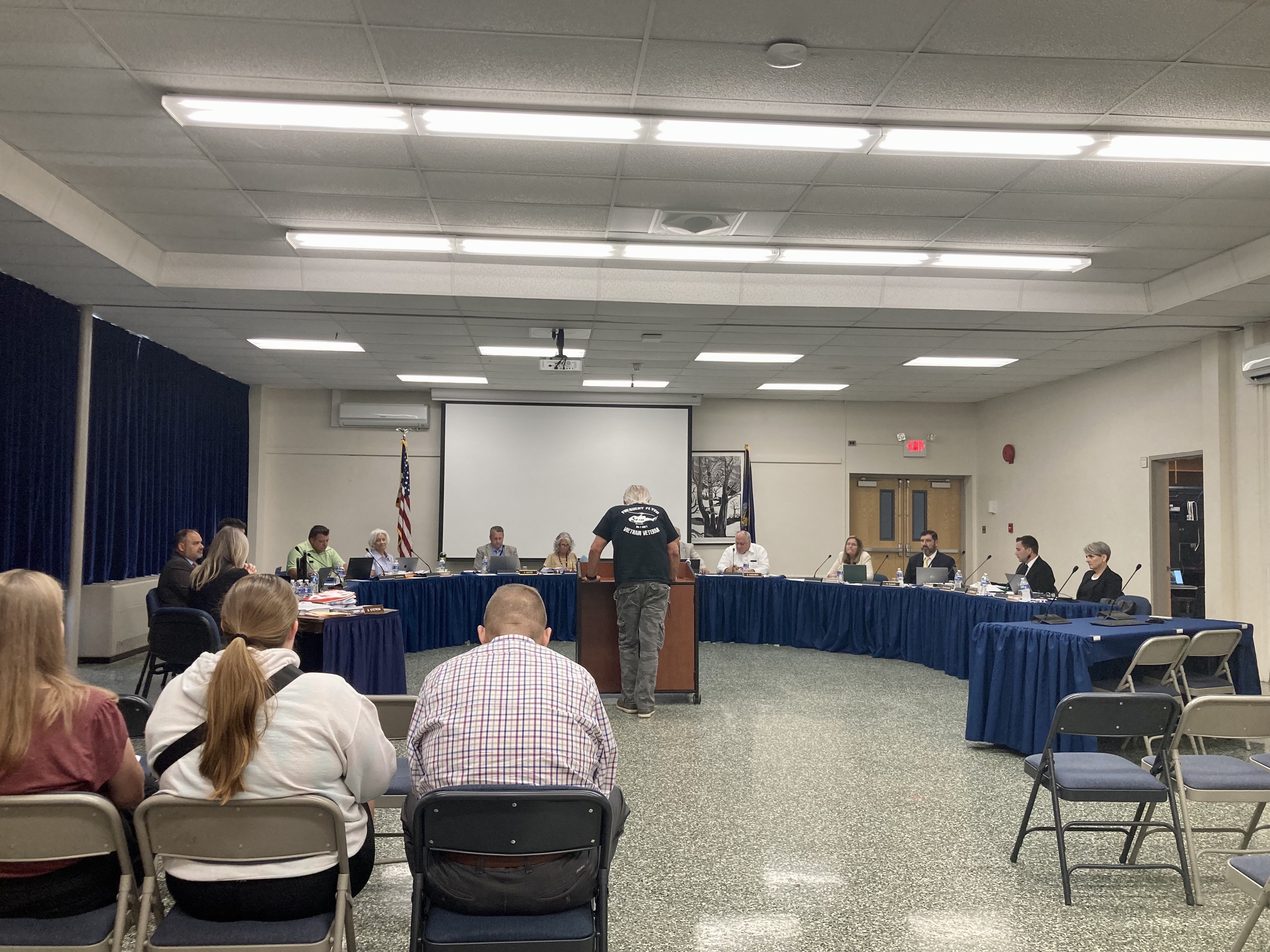 Northport Village resident Lenny Olijnyk speaks to board members at last week’s BOE meeting at which trustees voted unanimously to authorize leases for Bellerose and Dickinson Avenue Elementary schools. 