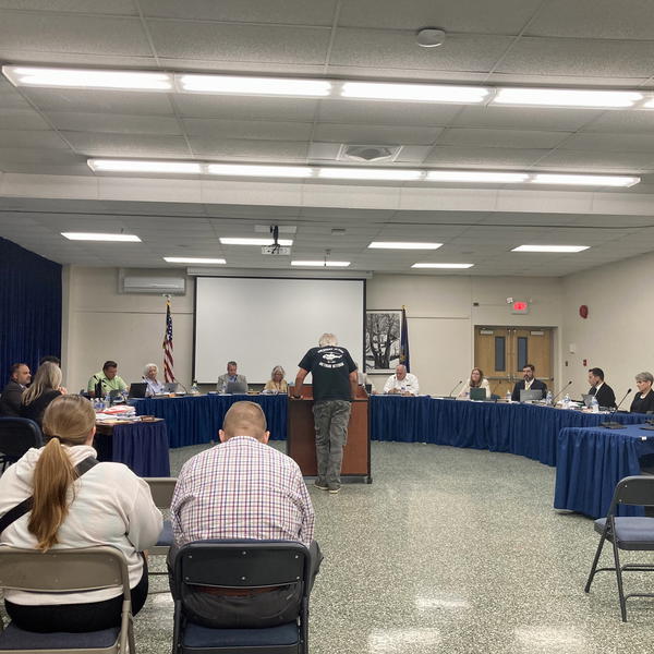 Northport Village resident Lenny Olijnyk speaks to board members at last week’s BOE meeting at which trustees voted unanimously to authorize leases for Bellerose and Dickinson Avenue Elementary schools. 