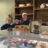 Charlie’s Bakery owner Casey Sandler (right) with barista Sam Hughes (left) and pastry and cake maker Erica Varley. 