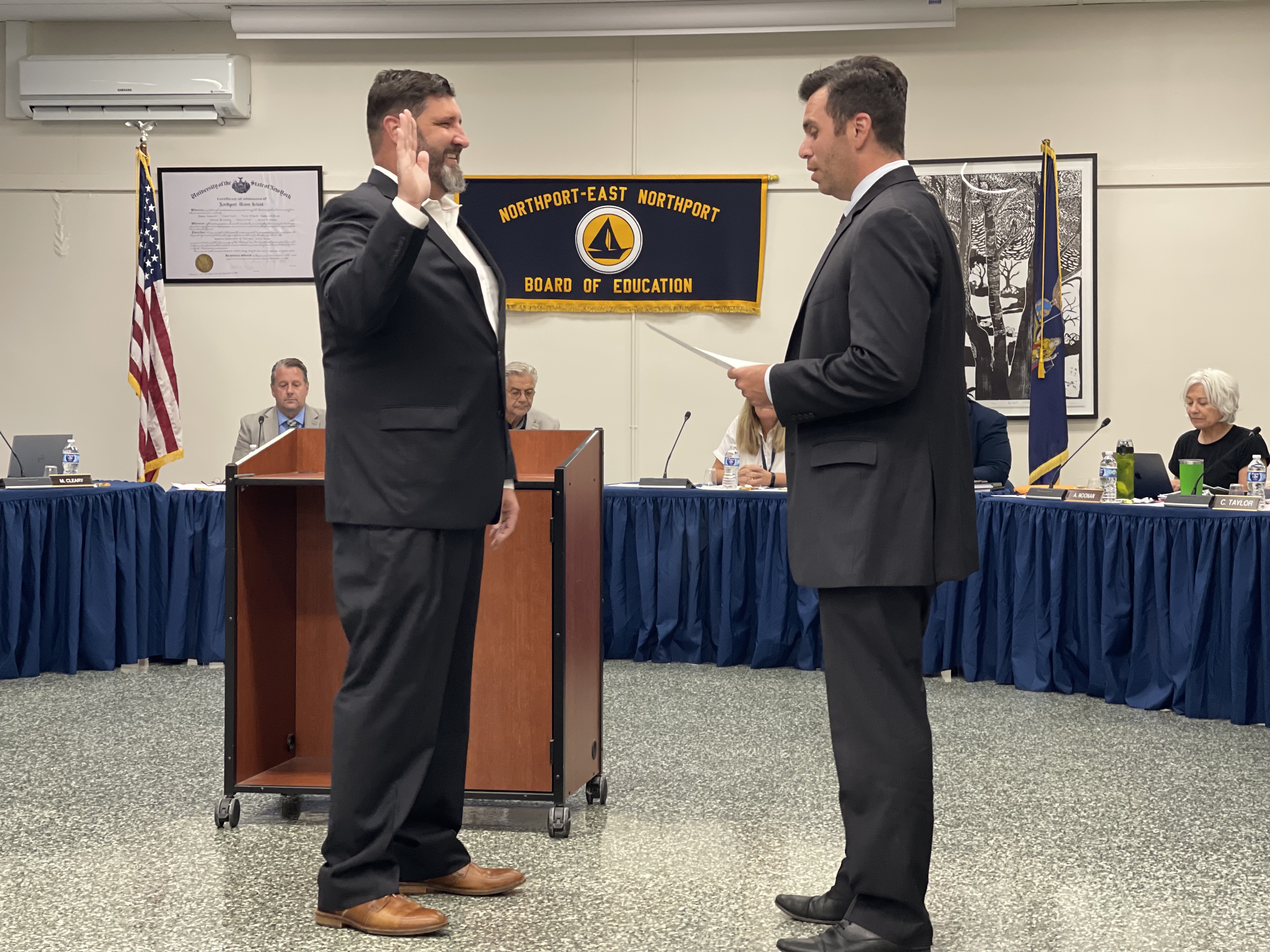 Freshly elected board member Michael Cleary was sworn in at the district&#39;s organization meeting on July 11. 