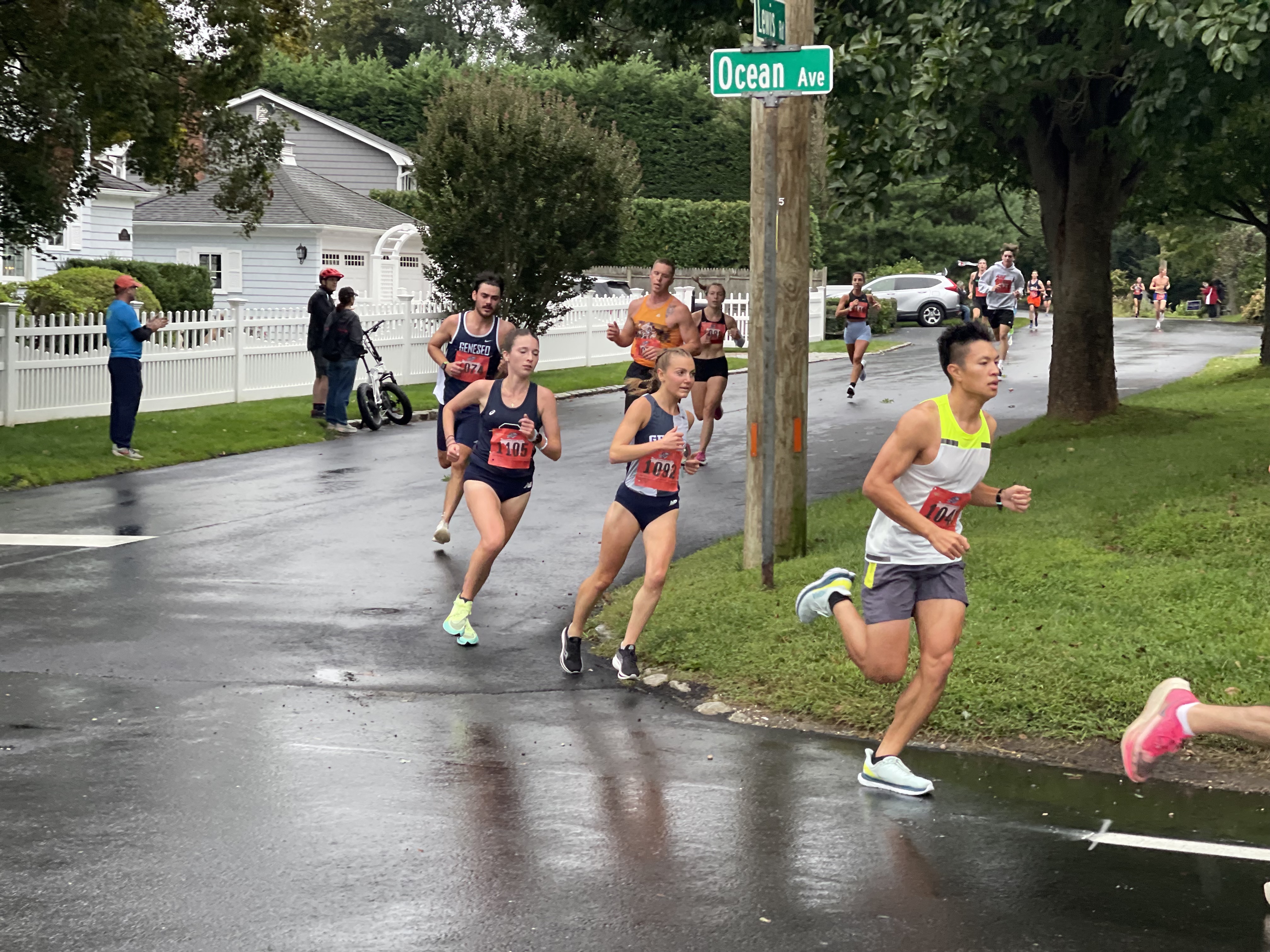 Runners in last year’s Cow Harbor 10K round the corner at Ocean Avenue and Lewis Road. 