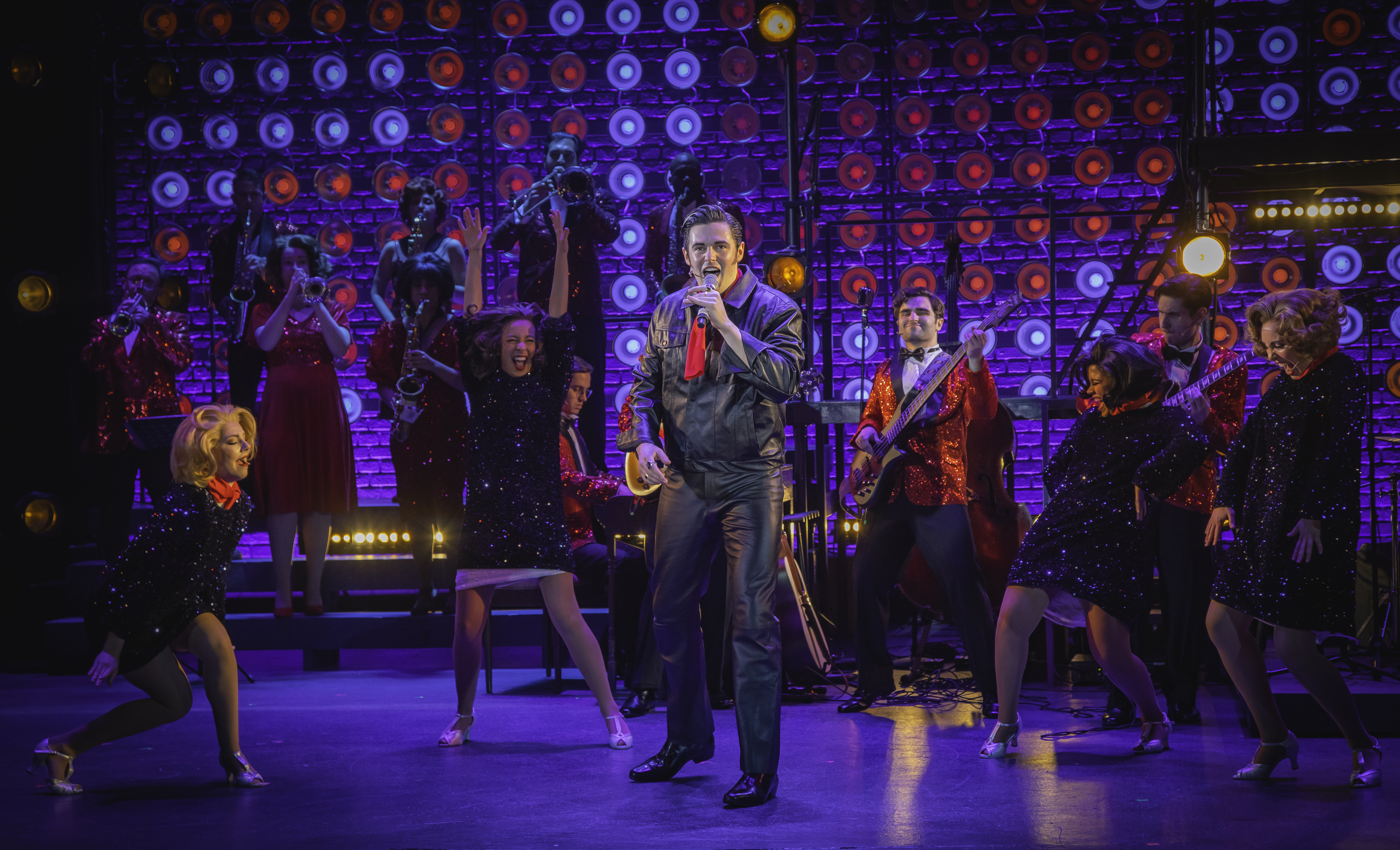 Joe Caskey (Elvis Presley) and ensemble perform in Engeman Theater&#39;s Heartbreak Hotel. Photo credit John W. Engeman Theater. 