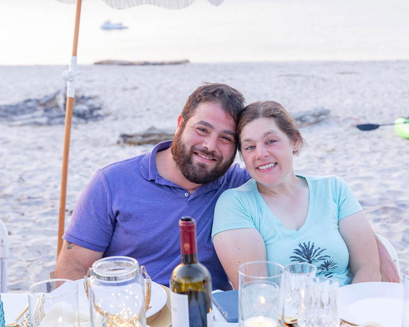 Kaitlyn McCready, owner of Kate’s Hair of the Dog in Northport, with her fiancé Luis Rivera. The couple was killed in a car accident in Florida last month. Image via Facebook. 