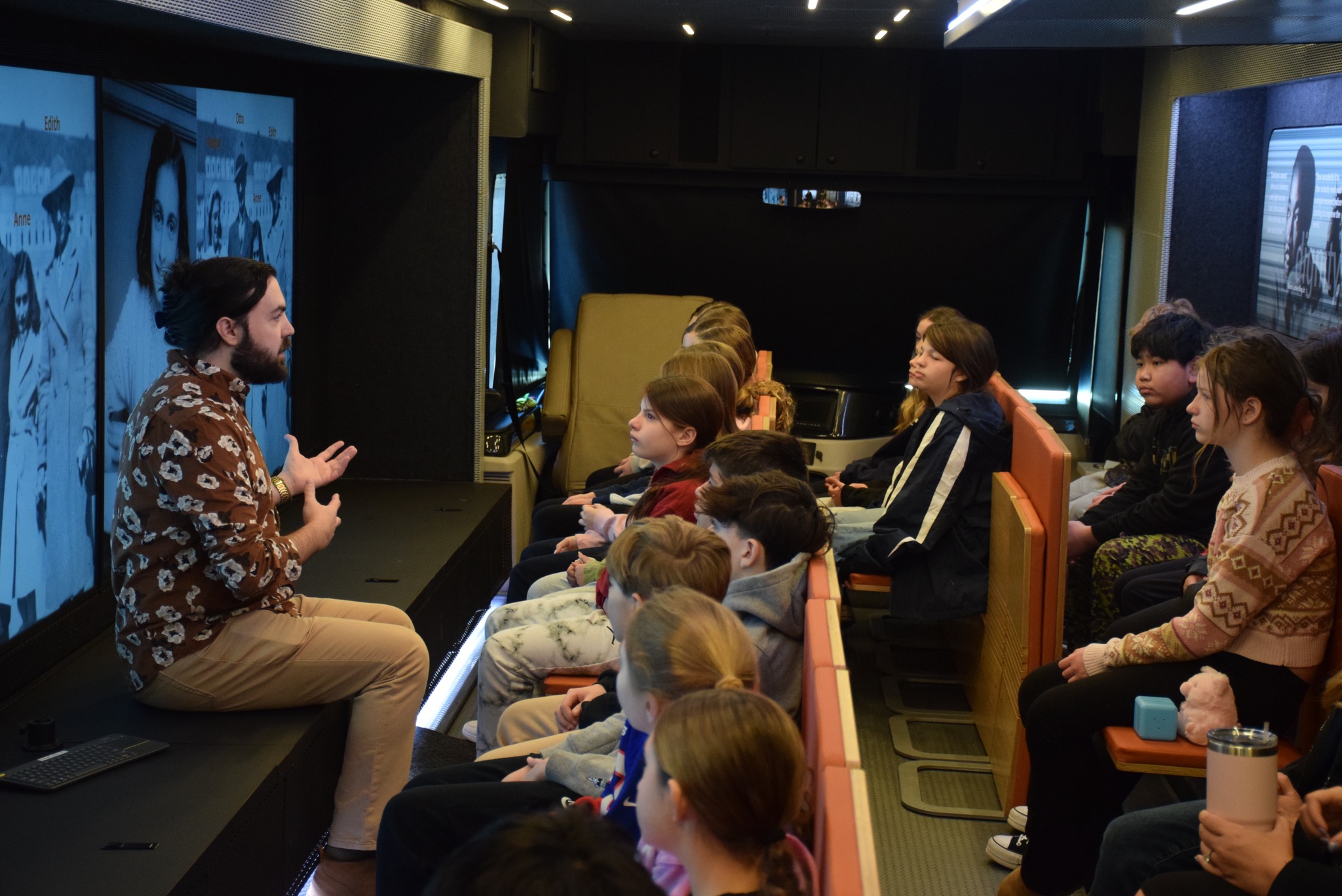 An educator with the Mobile Museum of Tolerance speaks with Northport Middle School students at a workshop dedicated to the story of Anne Frank. Photo courtesy Northport-East Northport Union Free School District. 