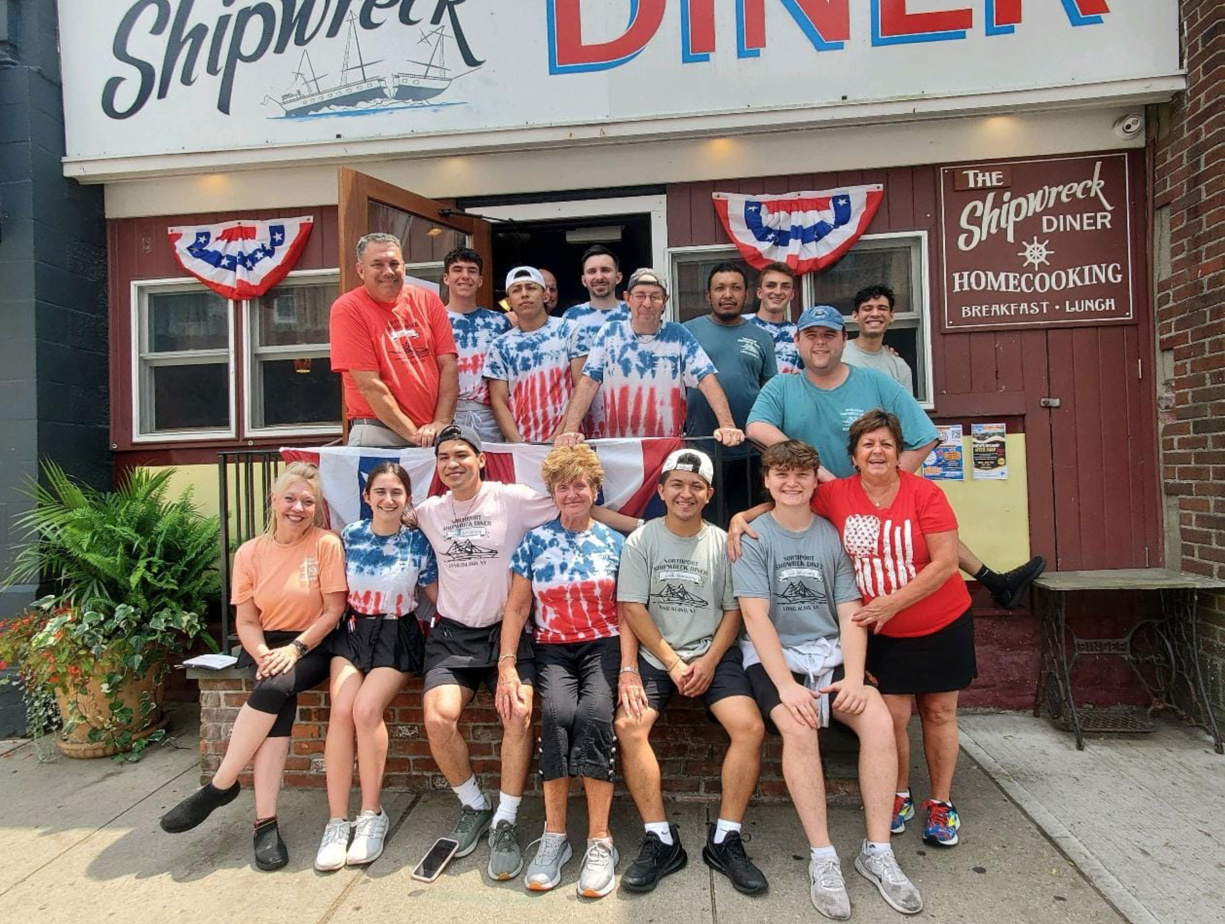 Owner Denis Beyersdorf with the crew of the Northport Shipwreck Diner. Photo via Facebook. 