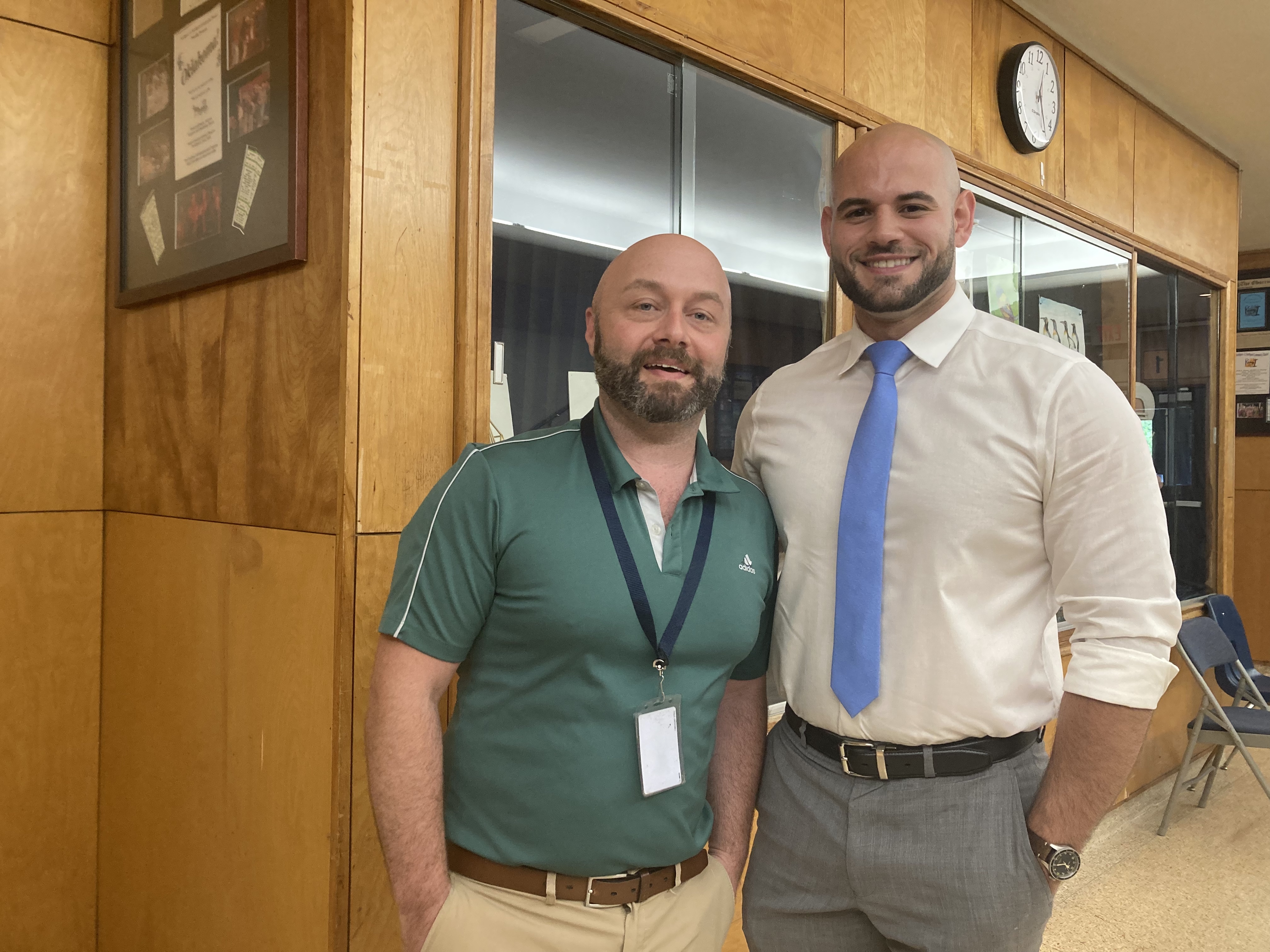 Michael Susinno (left) and Mike Pitre who, along with John McPartland, helped rescue Northport resident Tempestt Harris-Buckner from a burning vehicle yesterday evening. 