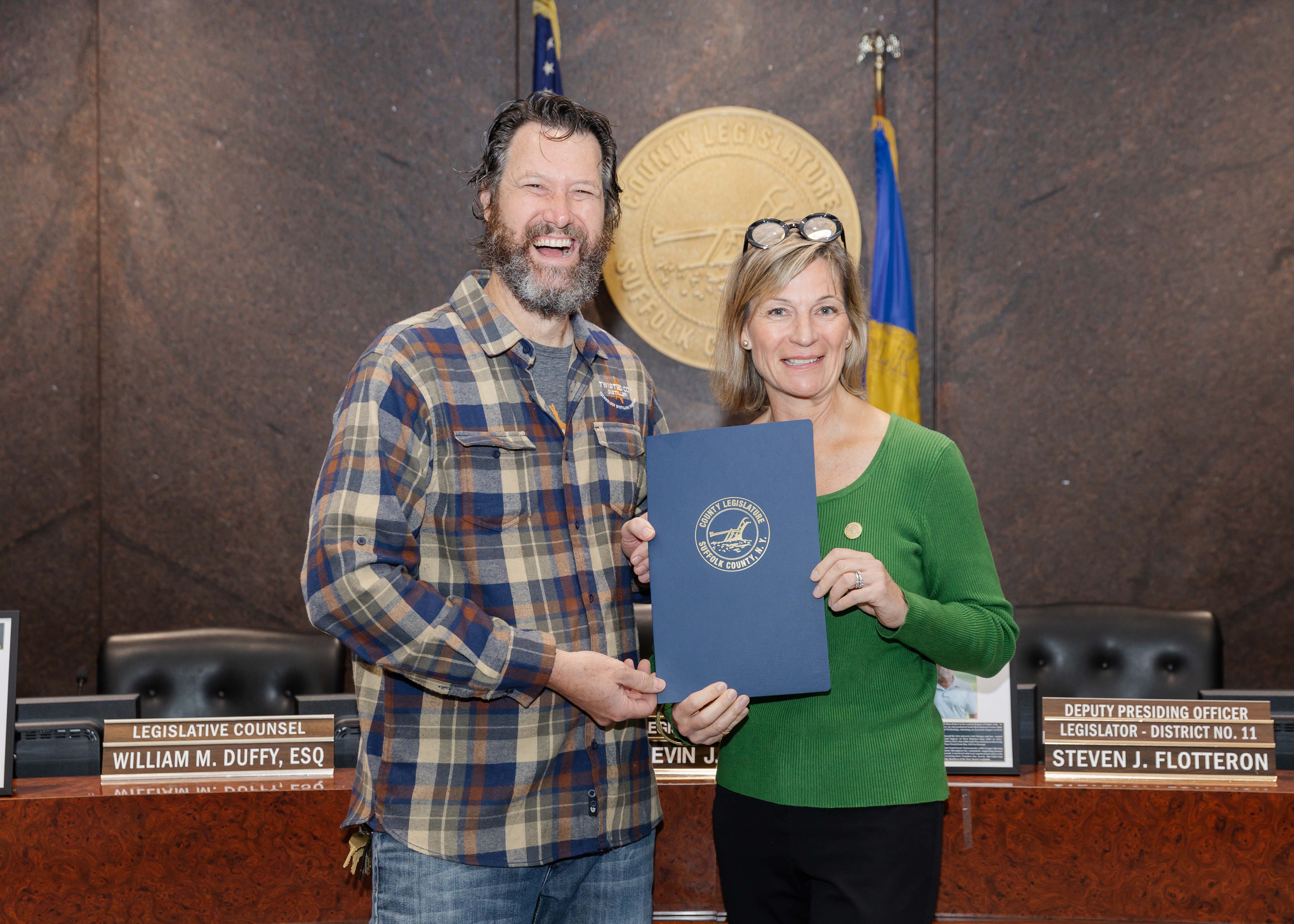 Legislator Stephanie Bontempi with Suffolk County Small Business Appreciation Honoree John Pawluk, owner of Twisted Cow Distillery in East Northport.