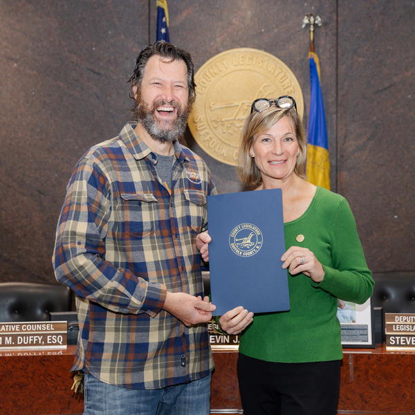 Legislator Stephanie Bontempi with Suffolk County Small Business Appreciation Honoree John Pawluk, owner of Twisted Cow Distillery in East Northport.