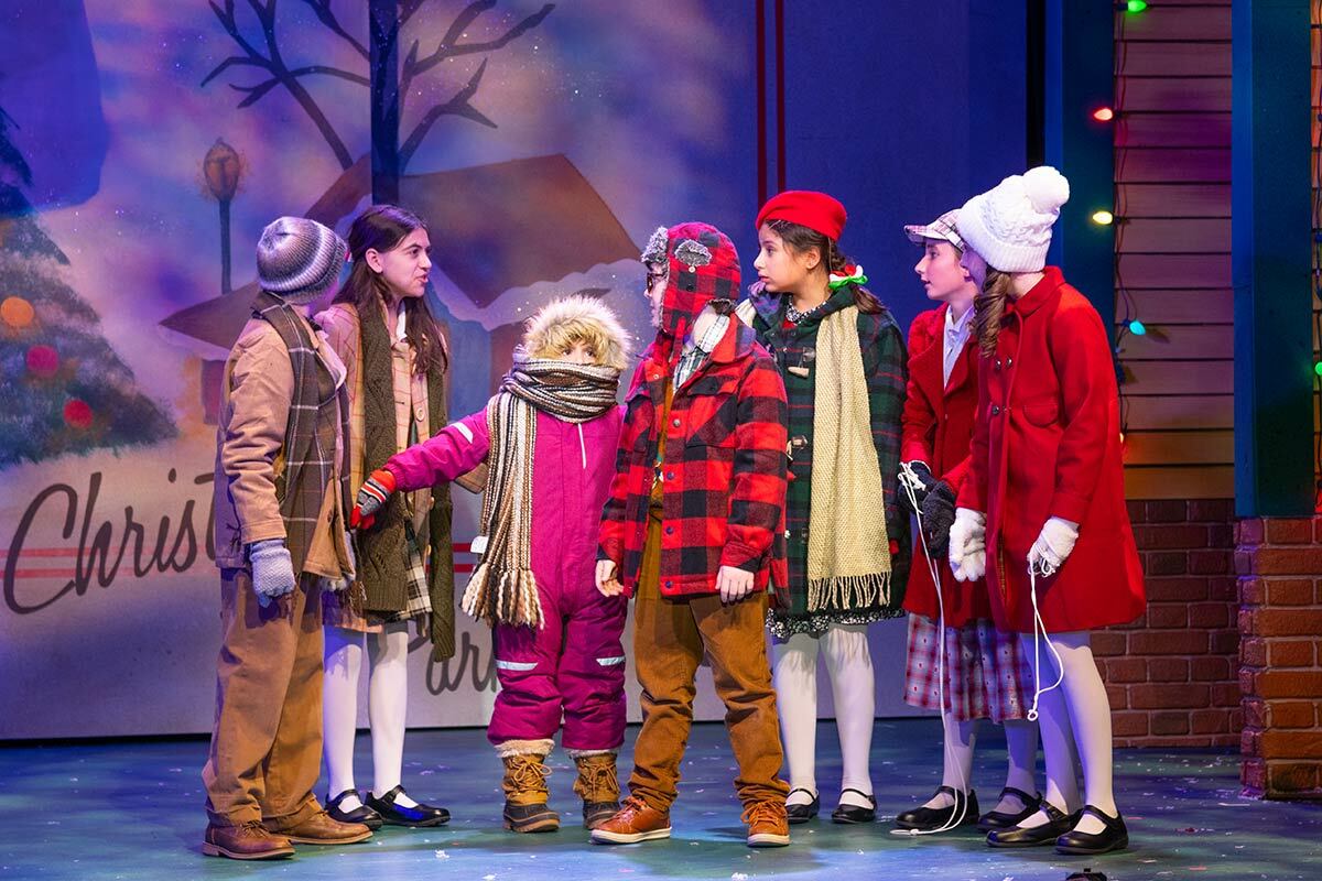 Jackson Parker Gill (playing Randy), Kaian Lilien (playing Ralphie) and ensemble in A Christmas Story, The Musical. Photo courtesy of the John W. Engeman Theater.