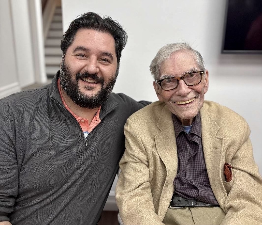 Arbi Asadourian, of RB Homes Realty, with prolific Northport artist Ward Hooper at an event last week that put on display – and made available for sale – hundreds of watercolor paintings stored in Hooper&#39;s home, which Hooper is moving out of after 50 years. Photo courtesy Arbi Asadourian. 