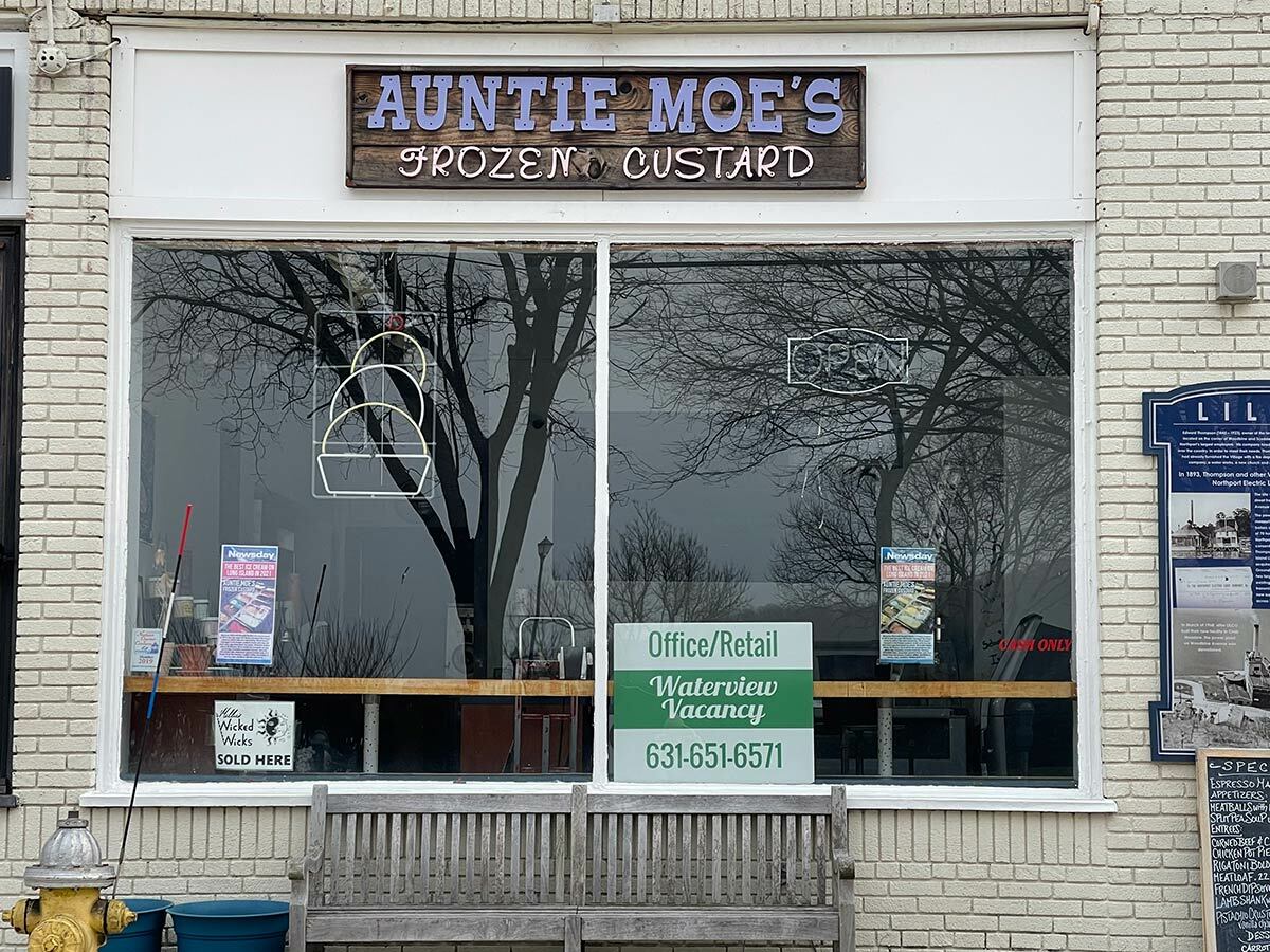 A sign in Auntie Moe’s shows the space is up for lease.