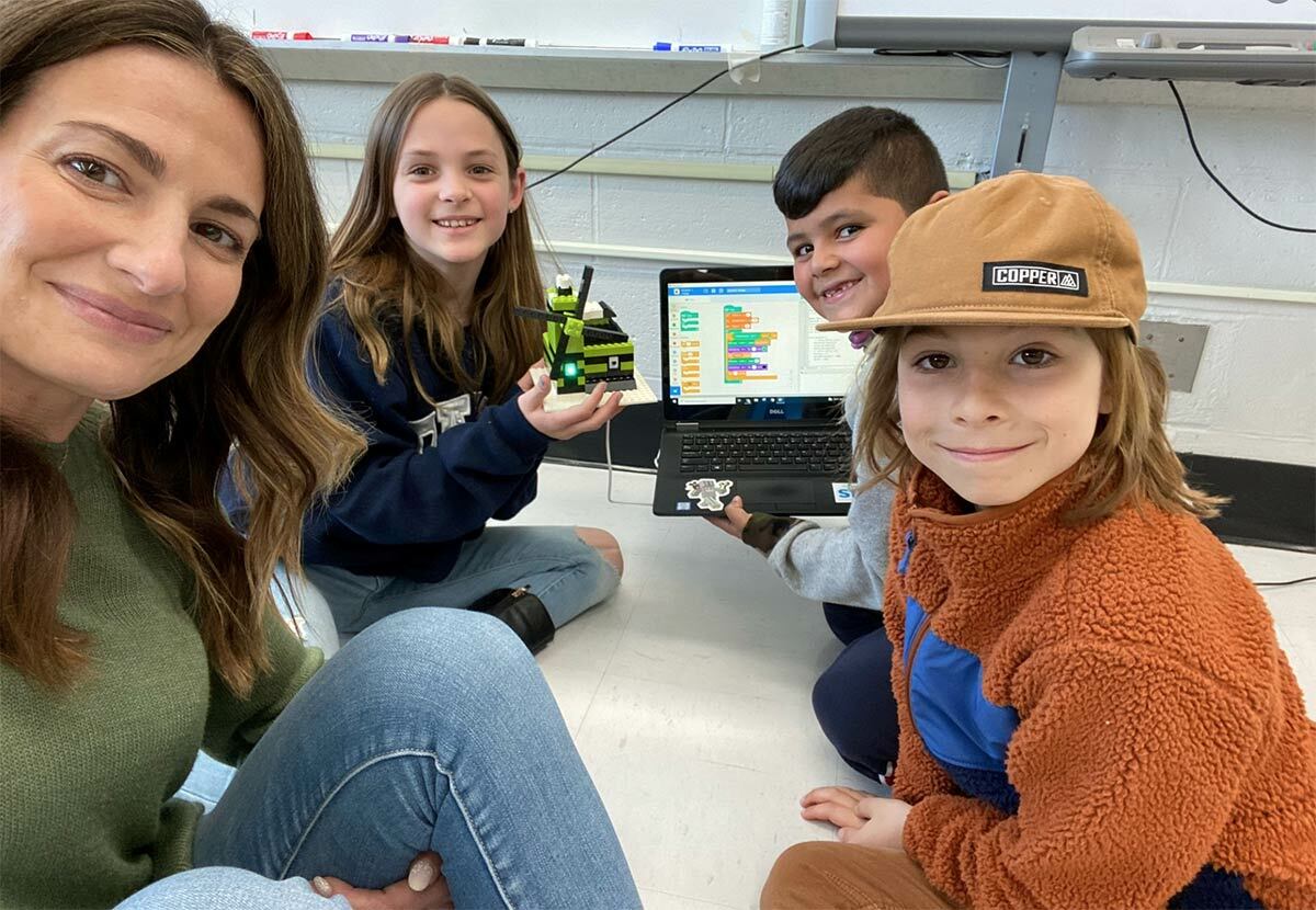 Jennifer Baranaskas teaches students to code in the makerspace as part of the STEM enrichment for all program. Photo courtesy of the Northport-East Northport UFSD.