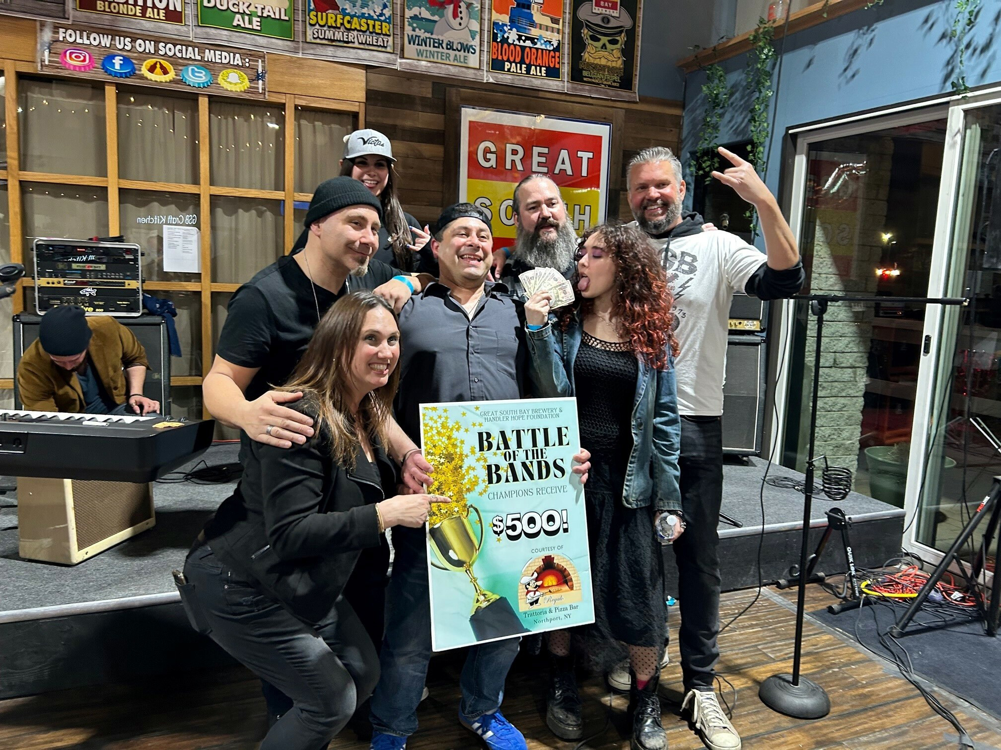 Fundraising efforts, including a Battle of the Bands at Great South Bay Brewery (winning band Candy Riot is pictured here), continue to help push the Lauren Handler Research Fund forward in its effort to monitor and detect early brain metastatic progression of certain breast cancers. Photo courtesy Darren Handler.