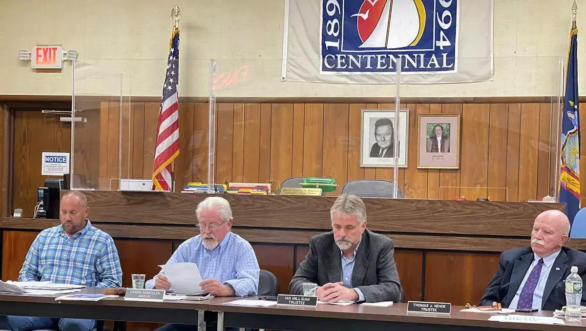 From left, Trustee Dave Weber, Mayor Damon McMullen, Trustee Ian Milligan and Trustee Tom Kehoe at Tuesday evening&#39;s board meeting.