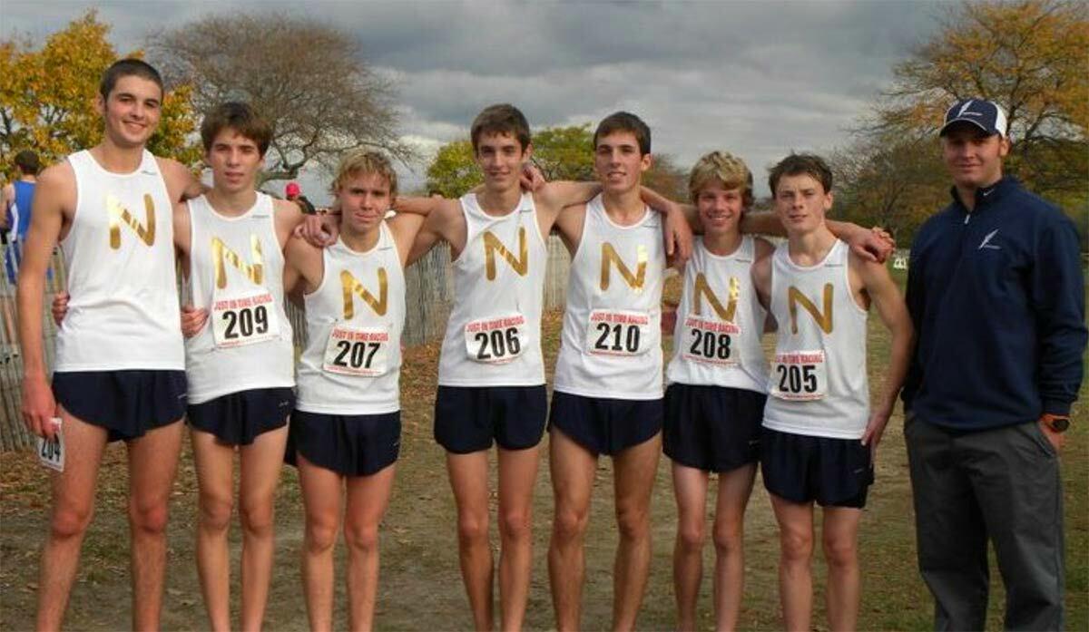 A throwback photo to Mikey Brannigan’s Northport High School running days. Brannigan is pictured here (second from right) with his track and cross country teammates and their coach, Jason Strom. Image via Facebook.