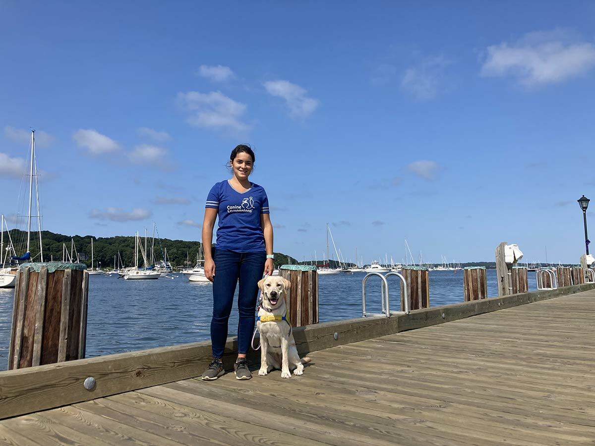 Brooke Stern and Nutmeg VI, the Labrador retriever she’s raising to be a service dog through Canine Companions.