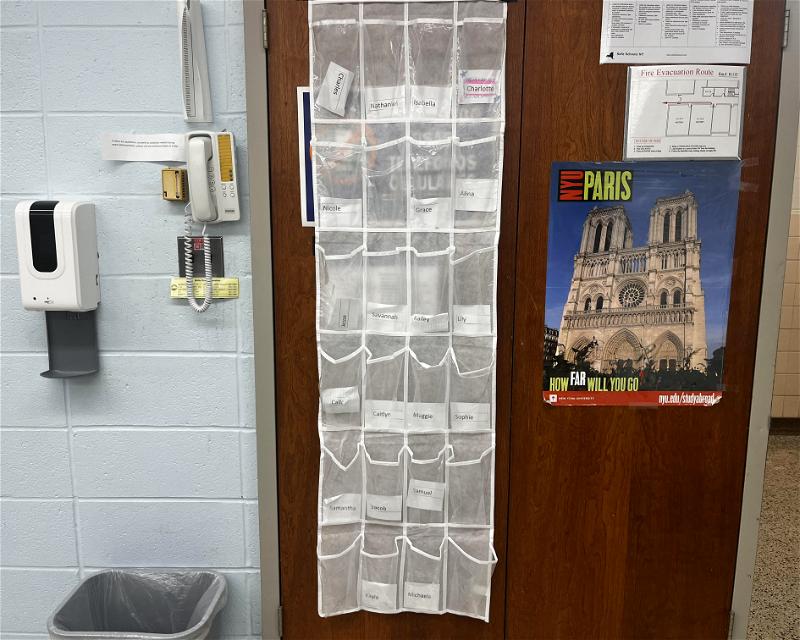 A renewed cell phone policy is back at Northport High School, with students required to deposit their cell phones into these clear multi-pocketed shoe organizers – or risk being marked absent. Photo by Vivienne Cierski. 