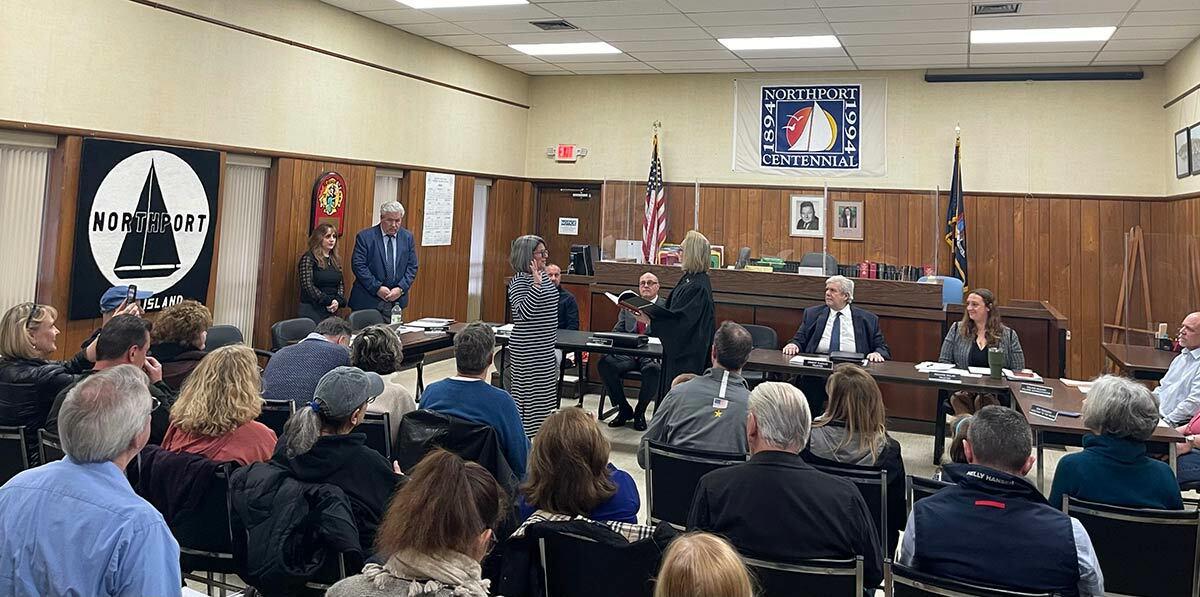 Newly elected Mayor Donna Koch gets sworn in at the April 5 Village board meeting.