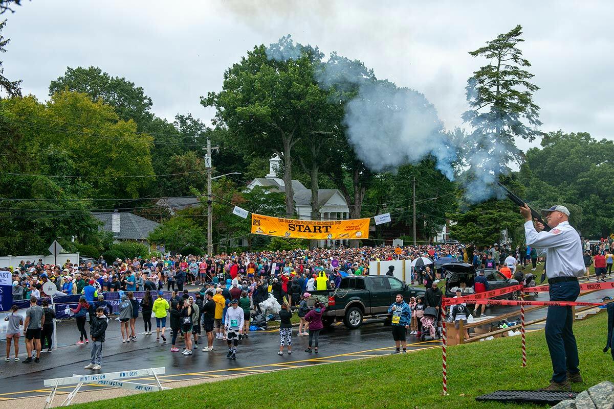 A view from the Great Cow Harbor 10K starting line yesterday, September 23. Approximately 3,560 of the 5,000 registered participants took to the streets of Northport despite forecasts of heavy rain and wind.