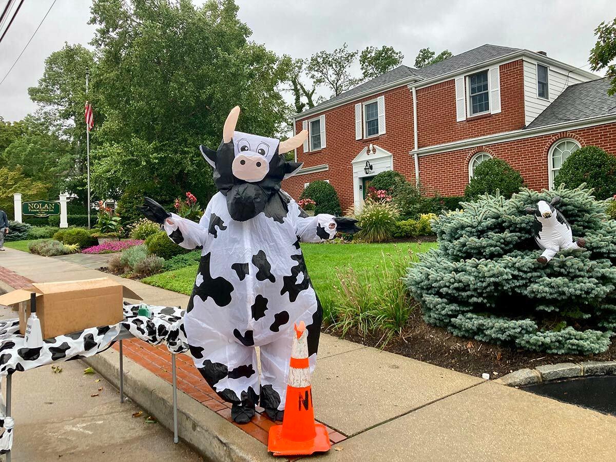 Nora Nolan of Nolan Funeral Home got in the spirit, handing out free cowbells while in full costume to interested passersby.