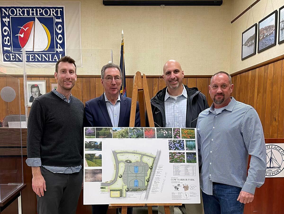 Pictured, from left: Chris Wiebke (1995 Northport High School basketball team member), NY State Senator Jim Gaughran, Doug Trani (1995 Northport High School basketball team member), and Northport Village trustee Dave Weber.