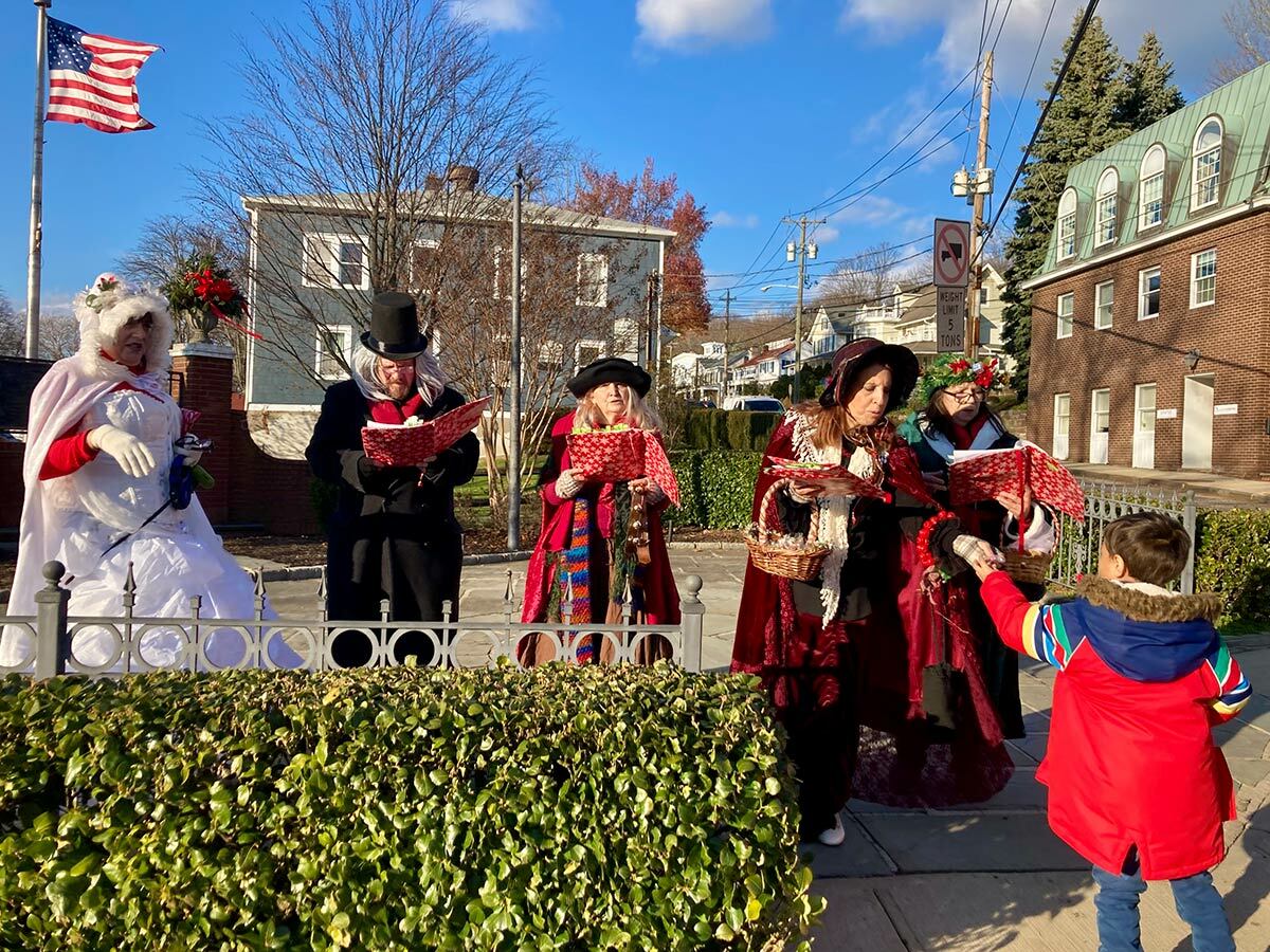 The Dickens Carolers on Main Street this past Sunday.