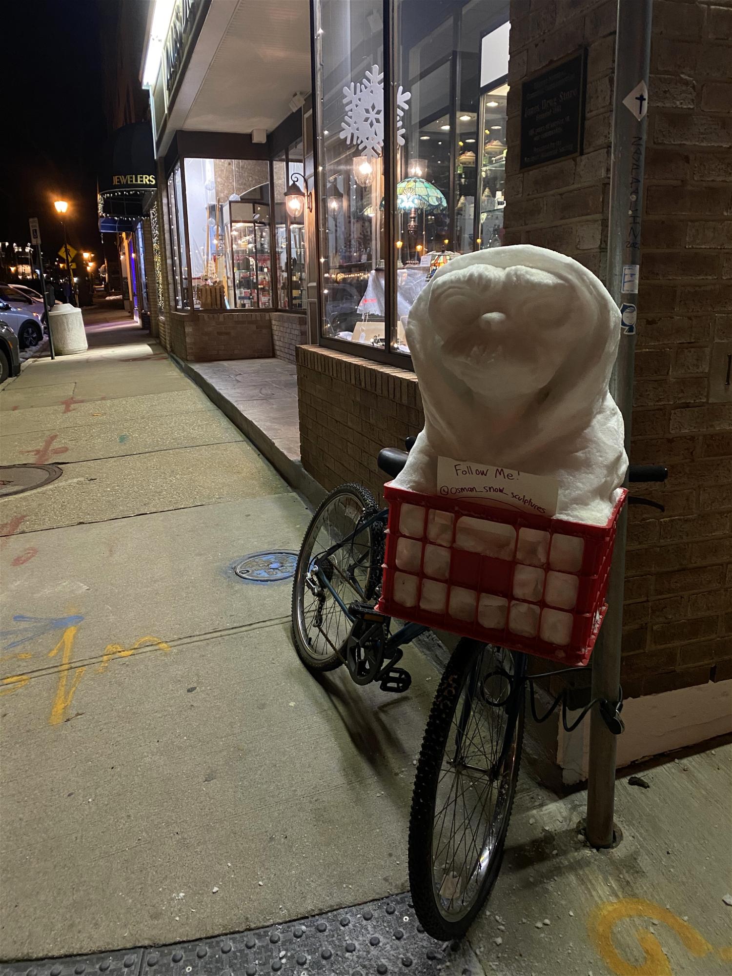 Sculpted by Northport resident Brandon Osman, E.T. surprised visitors to Main Street after the area&#39;s last snowstorm. 