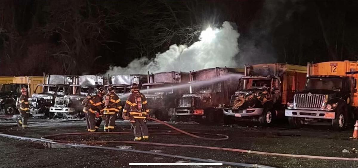 Firefighters on the scene of a nighttime fire at the Town of Huntington maintenance facility on Boxer Court in Huntington Station. Photo credit: Vee Graham.