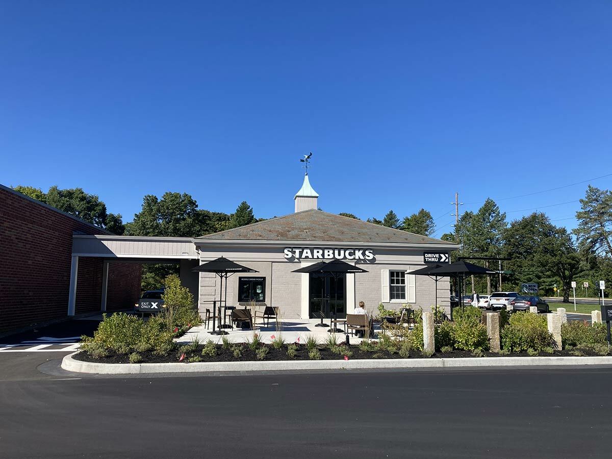 A brand new Starbucks in Greenlawn Plaza offers a mobile order pickup window, outdoor seating and drive-thru.