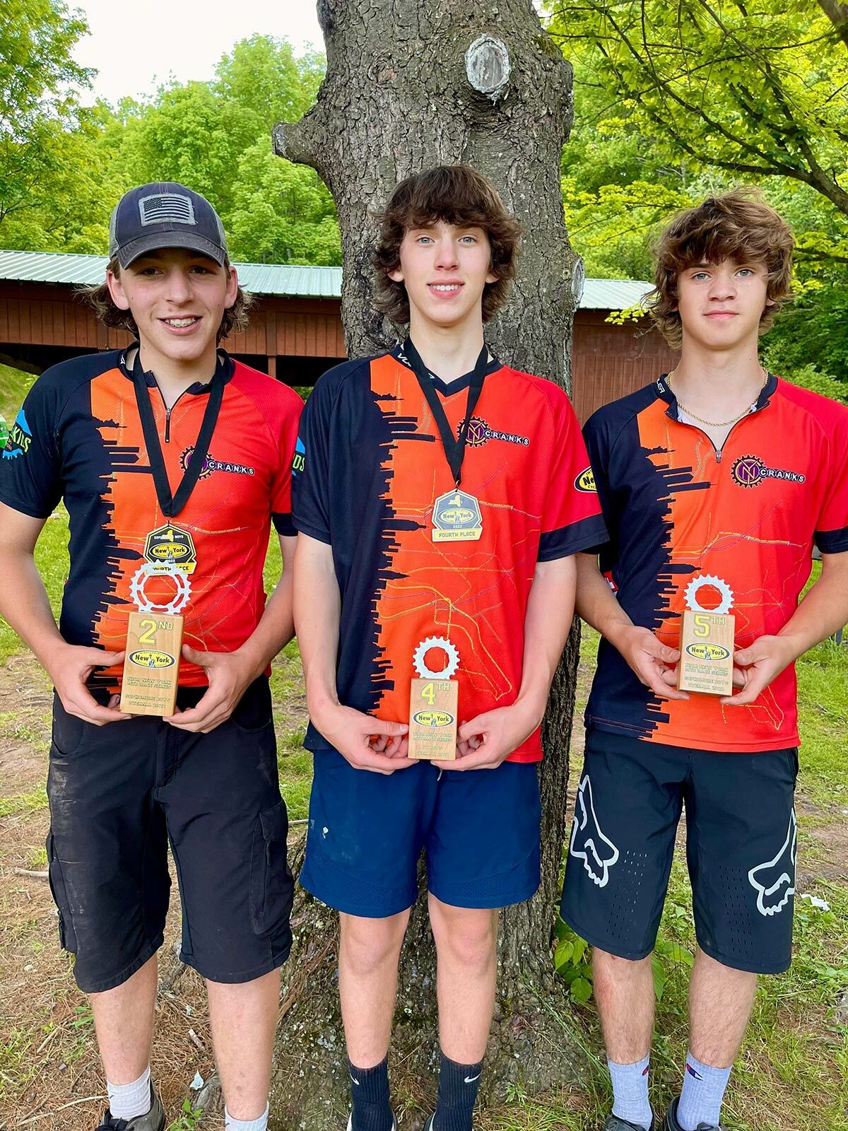 Northport High School sophomores Carter Mooers, Troy Werthner and Ryan DeMeo at the June 5 championship NICA race at Walnut Mountain Park in Liberty, New York. Photo courtesy of Amy Lindstadt DeMeo.