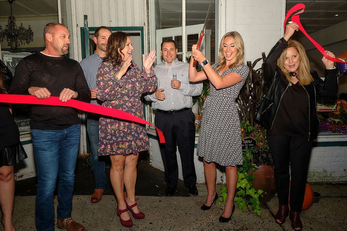 Business partners Jennifer Pinto and Kelley Henneberry, alongside Northport Village Trustee Dave Weber and Town of Huntington Councilwoman Joan Cergol, at JK Consulting&#39;s October 27 ribbon-cutting.