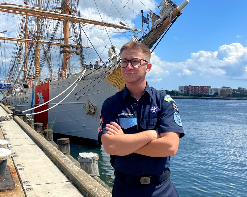 East Northport resident and Northport High School graduate Jonas Raio outside the Coast Guard Cutter Eagle. Raio, an outgoing boatswain for Sea Scout Ship 270, spent a week aboard the vessel. Photo courtesy Sea Scout Ship 270. 