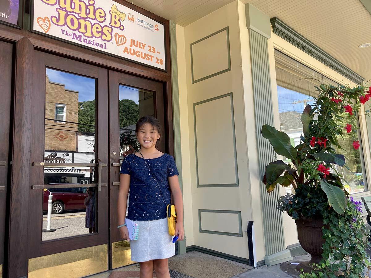 Guest writer Abigail Pun, a rising fourth grader at Fifth Avenue Elementary School, at the Engeman Theater in Northport Village, where she watched and reviewed Junie B. Jones The Musical.