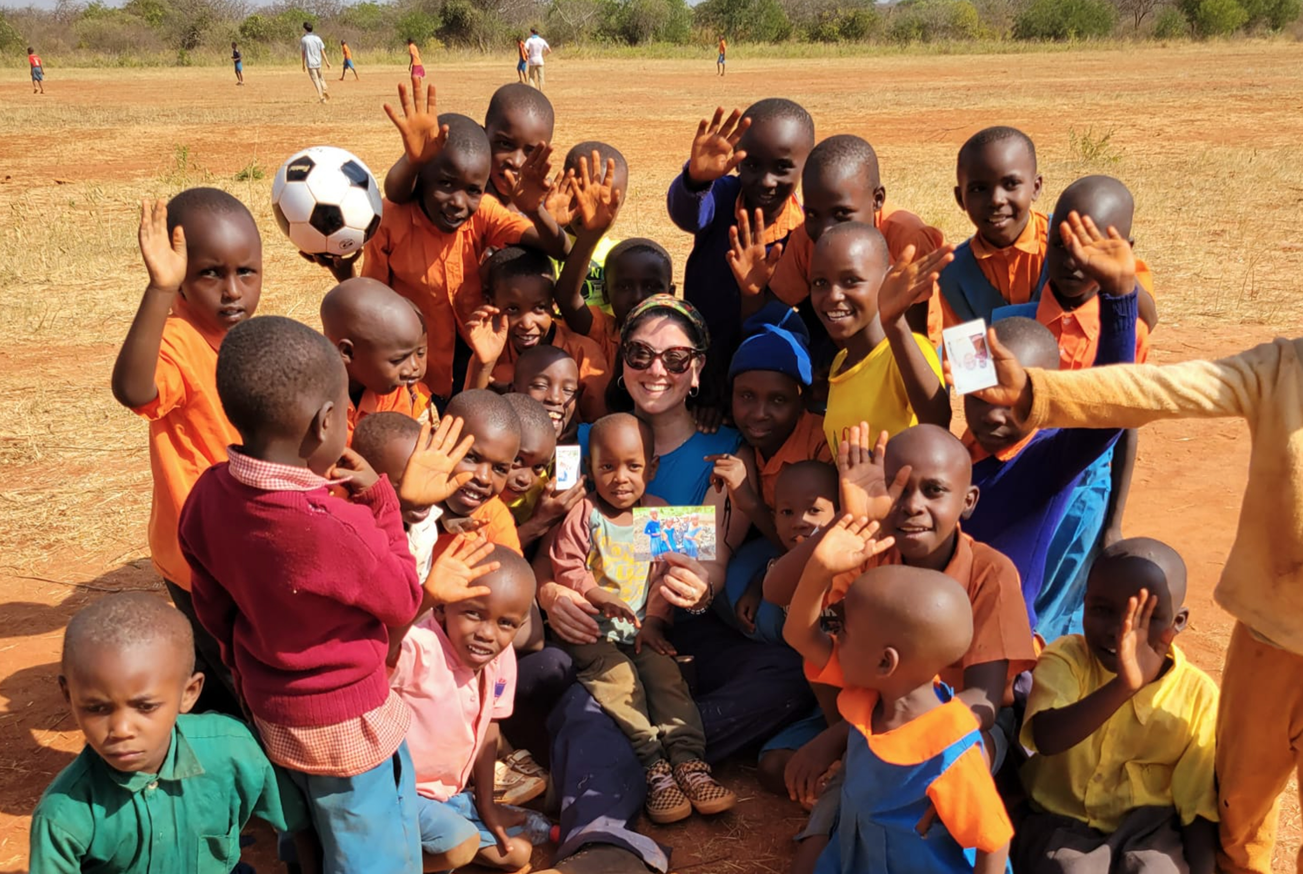 East Northport resident Karen Paquet, pictured here on her most recent trip to Kenya with Students for 60,000, turned the loss of her son Caleb into a life of service to others.