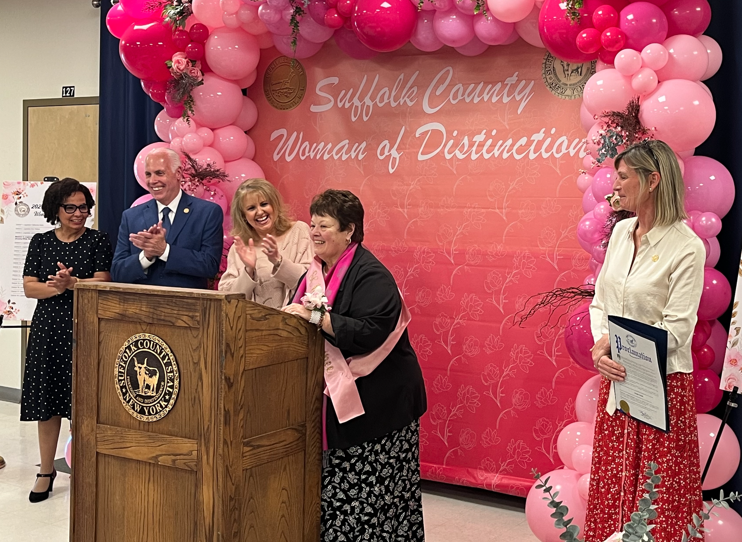 Legislator Stephanie Bontempi (right) with Suffolk County Woman of Distinction honoree Linda Guido of Huntington (center).