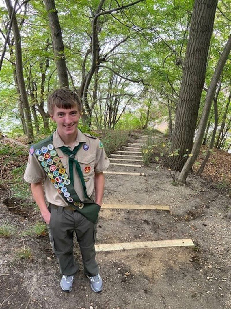 Northport Boy Scout Joseph Luft on the trail and steps he rebuilt on the Vanderbilt Estate. Vanderbilt Museum photo