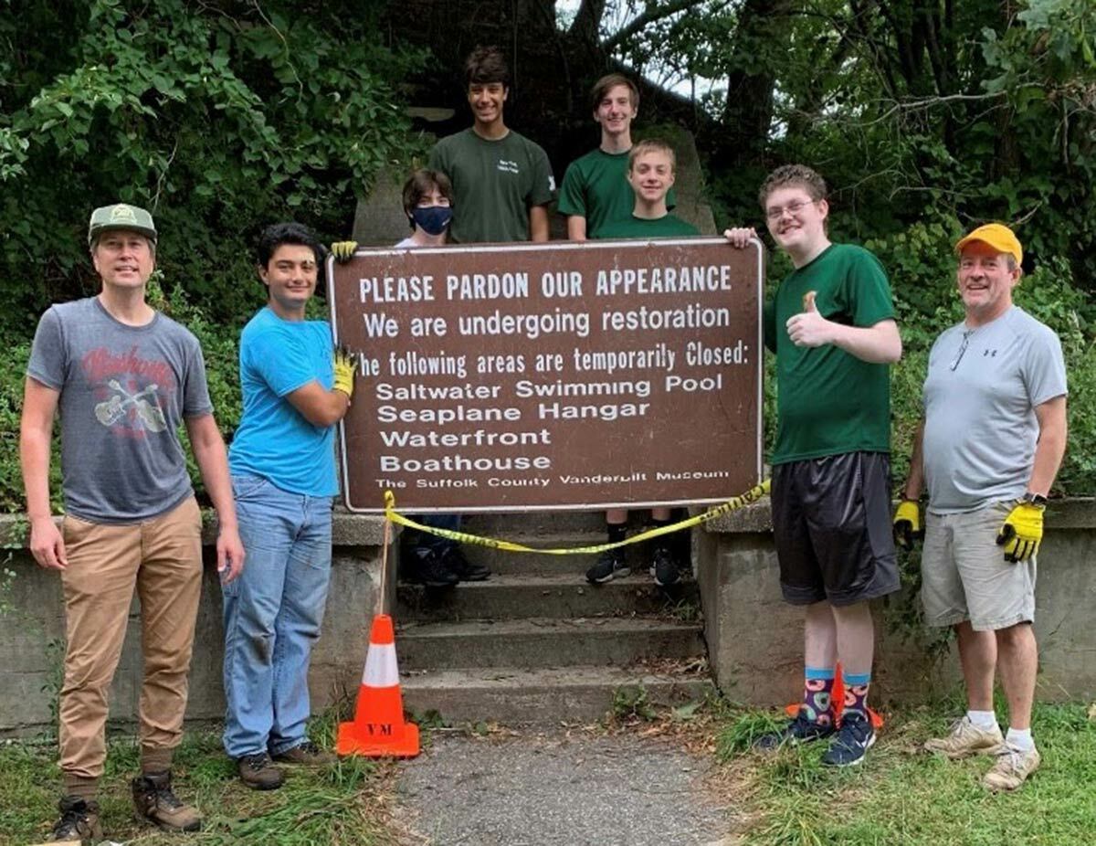 Local dad Kyle Roelofs, troop members Michael Monda, Connor Jorgensen, James Posillico, Joe Luft, Ryan Edebohls, Will Ponder, and Joe’s dad, David Luft, at the Vanderbilt Museum Trail.