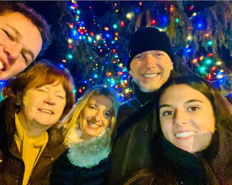 Former South Huntington resident Jim Mahon, Jr. has been returning to Northport Village for the holidays every year for 20-plus years. The Mahon family’s selfie by the tree has become one of their many traditions. Photo courtesy Jim Mahon, Jr.