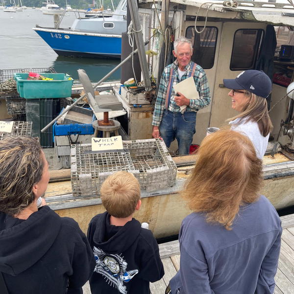 Bayman and former Northport Mayor George Doll talks about his work on the water at a past Maritime Day celebration.