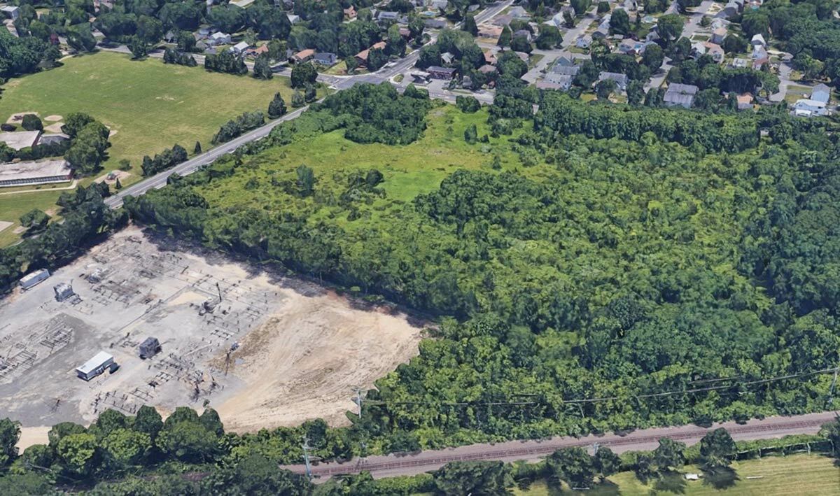 The Huntington Town Board voted 4-1 in favor of the new limited equity structure for Matinecock Court, an affordable housing development being built at the corner of Pulaski Road and Elwood Road. Image via Google Earth.