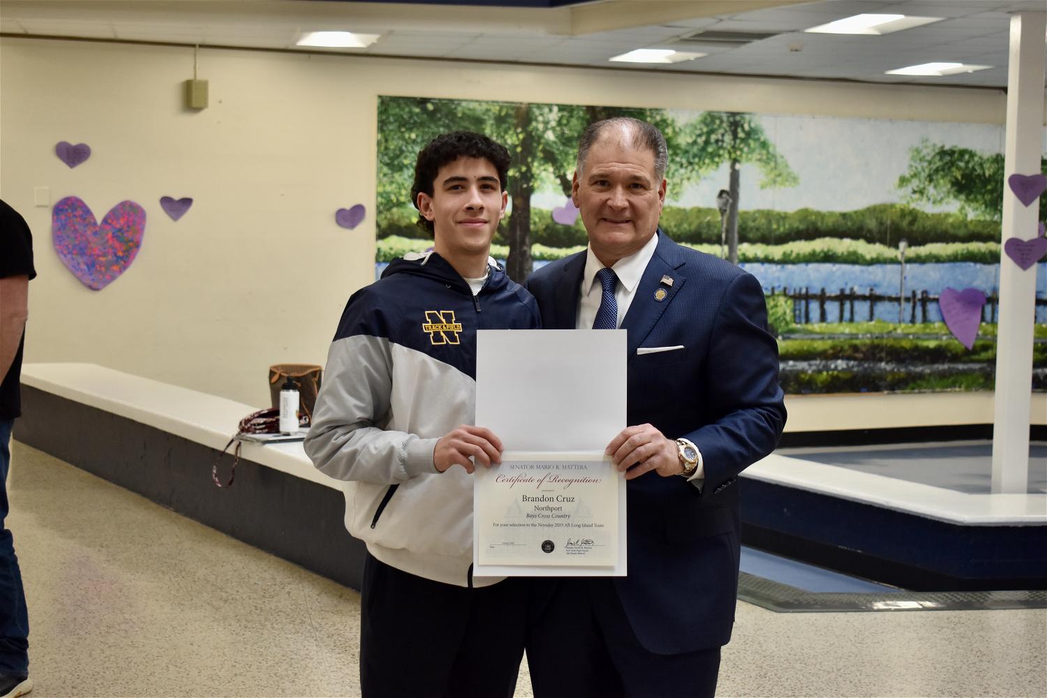 Senator Mattera and All-Long Island cross country runner Brandon Cruz. Photo courtesy of the Northport-East Northport School District. 