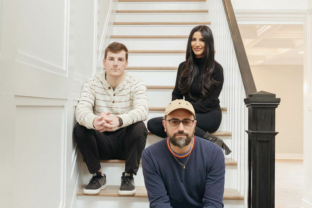 Michael Sadis and teammates Sana Aminzada and William Doyle during a photo shoot at a recent listing. All photos by Julian Bracero, courtesy of Michael Sadis.