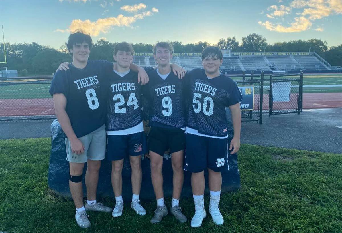 Northport High School varsity football team captains, from left: Owen Johansen, Jason “JJ” Ahlstrand, Jack Sandrib and Andrew Canales. Photo courtesy Northport Football Booster Club