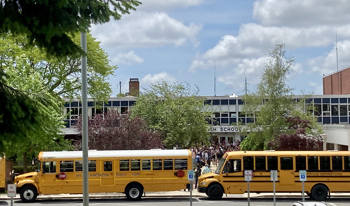 A large crowd of students gathered outside Northport High School this afternoon, part of a nationwide walkout organized by Students Demand Action after the tragic school shooting in Uvalde, Texas.