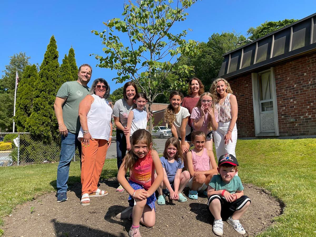 Donna Koch (second from left) with, from left, Matt Gorman, Nicole Tamaro, Barbara Bolen and Sara Abbass – and a gathering of supportive children.