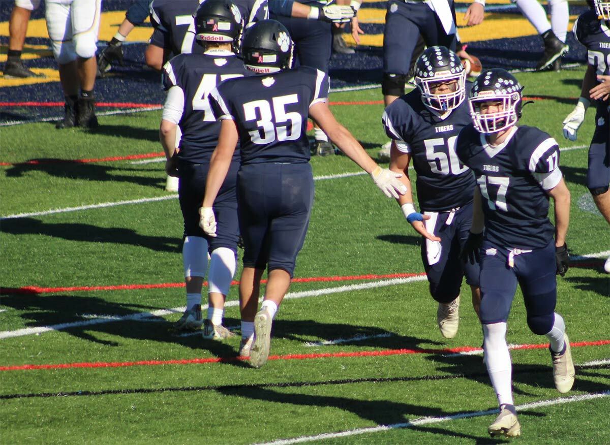 The Northport Tigers, pictured here in their November 6 playoff win, suffered a last-minute loss to Lindenhurst in the semifinals this past Friday, November 12. Photo credit: Laura Holden