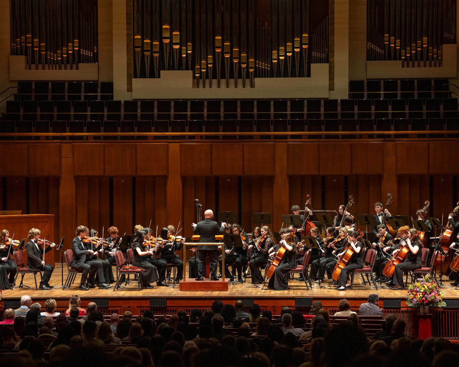 Michael Susinno conducts the Northport High School orchestra at its February performance at the Kennedy Center in Washington DC. Photo courtesy of the Kennedy Center. 